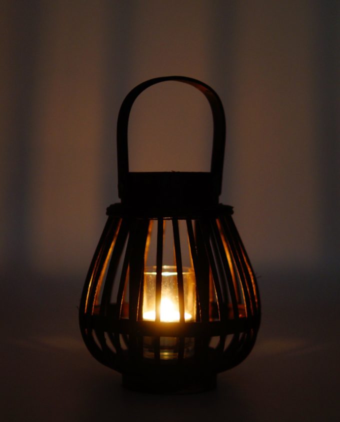Lantern made of black color bamboo with tealight glass included.