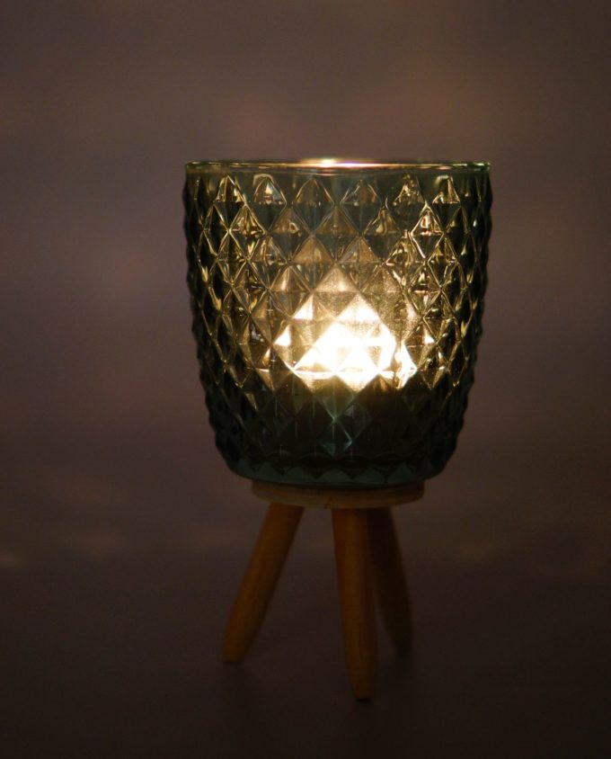 Votive of tealight light green glass with wooden legs