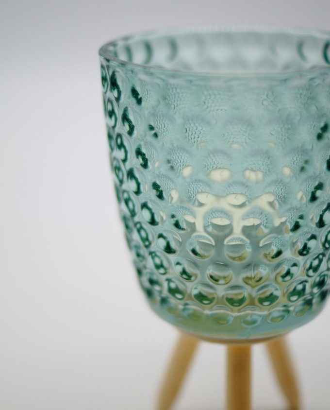 Votive of tealight light green glass with wooden legs