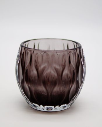 Votive of heavy tealight purple glass