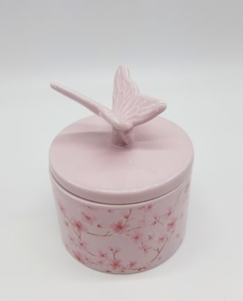 Πορσελάνινη ροζ θήκη κοσμημάτων με καπάκι με πουλί. Διαστάσεις: ύψος 13 cm, διάμετρος 11 cm