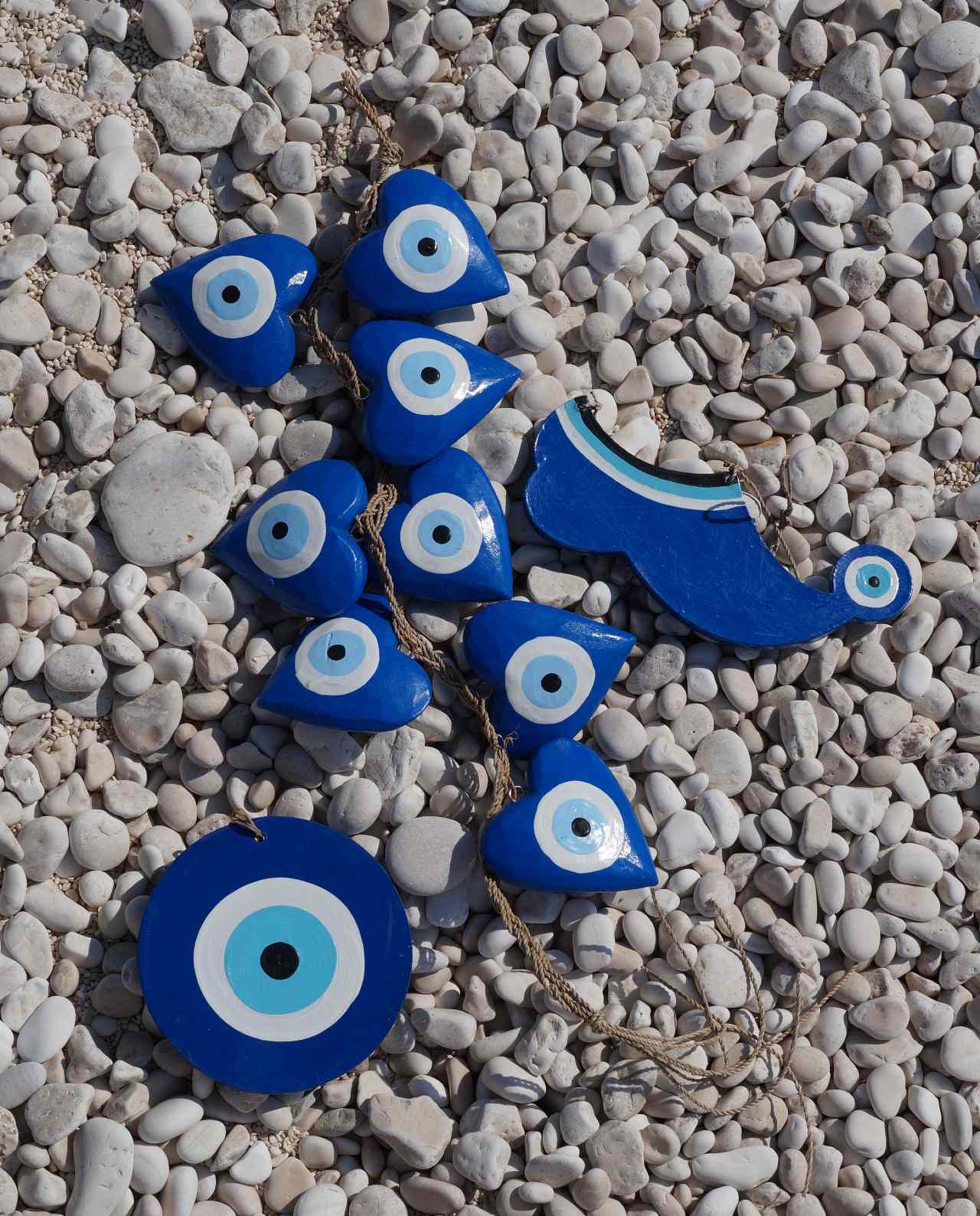 Blue handmade wooden evil eyes